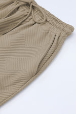 Load image into Gallery viewer, Black Textured Loose Fit T Shirt and Drawstring Pants Set
