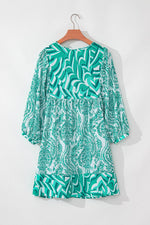 Load image into Gallery viewer, Rose Bohemian Print Puff Sleeve Tied V Neck Flared Mini Dress - Fashion Queen
