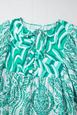 Load image into Gallery viewer, Rose Bohemian Print Puff Sleeve Tied V Neck Flared Mini Dress - Fashion Queen
