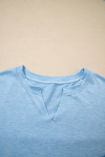 Load image into Gallery viewer, Myosotis Notched Neck Terry Raw Hem Long Sleeve Top
