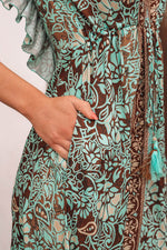 Load image into Gallery viewer, Green Floral Print V Neck Ruffled Trim Backless Tassel Waist Maxi Dress - Fashion Queen -  6
