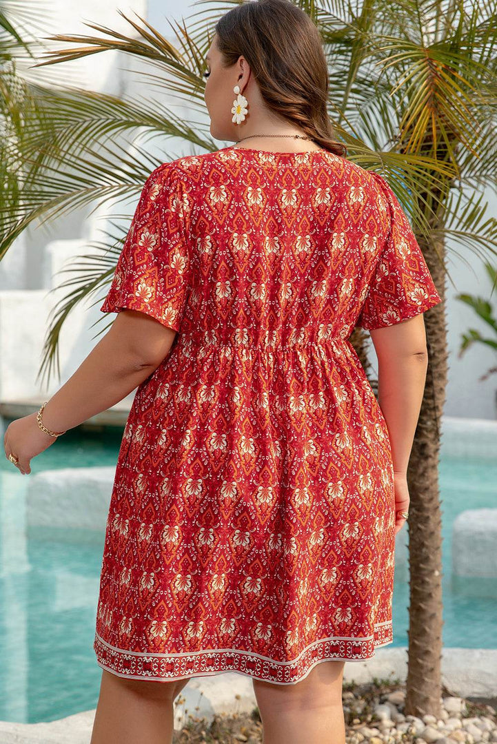 Orange Plus Size Printed Surplice Neck Empire Waist Flowy Mini Dress - Fashion Queen -  14