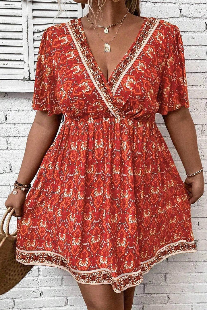 Orange Plus Size Printed Surplice Neck Empire Waist Flowy Mini Dress - Fashion Queen -  4