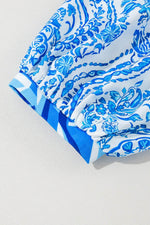 Load image into Gallery viewer, Rose Bohemian Print Puff Sleeve Tied V Neck Flared Mini Dress - Fashion Queen
