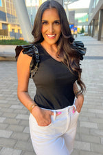 Load image into Gallery viewer, Black Leatherette Ruffle Patchwork Ribbed V Neck Bodysuit
