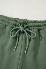 Load image into Gallery viewer, Black Button Drawstring Hooded Pullover and Casual Short Set
