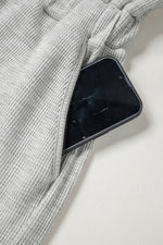 Load image into Gallery viewer, Light Grey Waffle Knit Sleeveless Buttoned Front Drawstring Waist Romper
