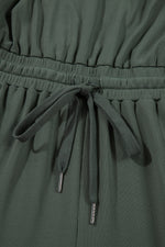 Load image into Gallery viewer, Vineyard Green Buttoned Drawstring Waist Sleeveless Wide Leg Jumpsuit
